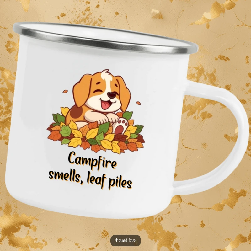 Funny camping mug featuring a joyful hound dog character energetically rolling in a large pile of colorful autumn leaves, ready for the trail.