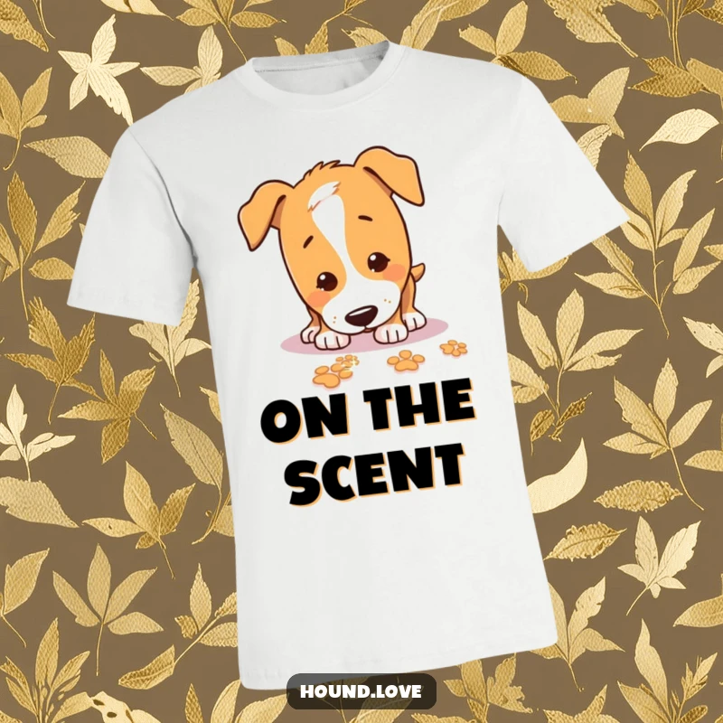 Funny T-Shirt showing a playful hound dog with its nose down, joyfully tracking sparkling paw prints on an exciting scent.