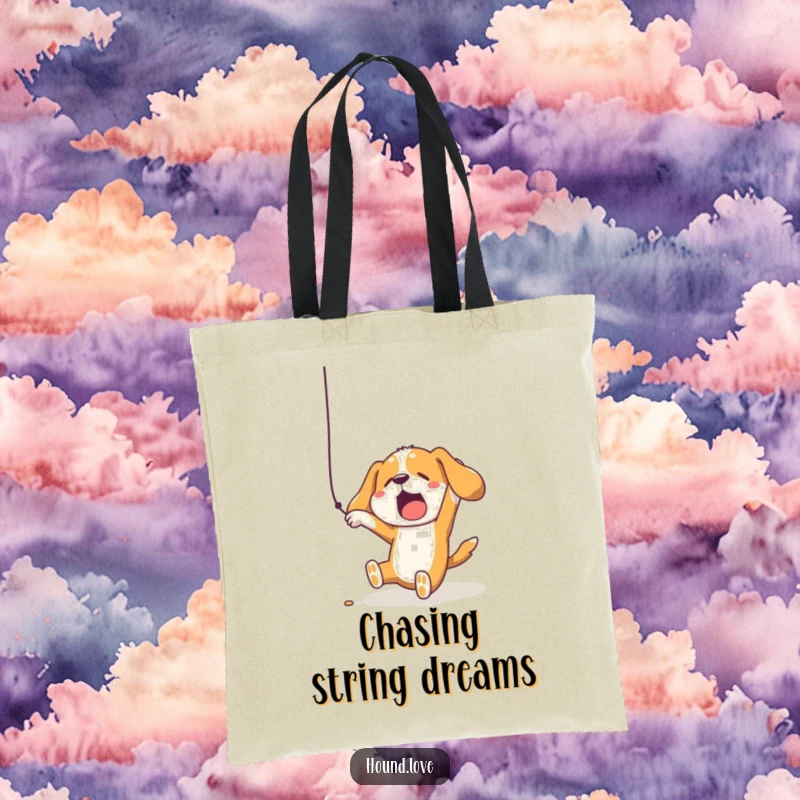 Durable tote bag featuring a funny hound dog in a comical fall, reaching for a dangling string, for humorous errands.